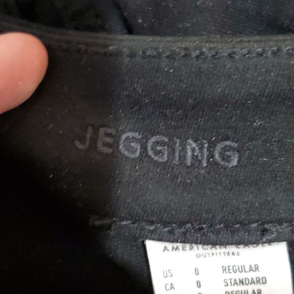 AMERICAN Eagle 28x27 black size 0 super stretch jeggings - Picture 7 of 8